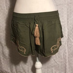 Green and tan shorts